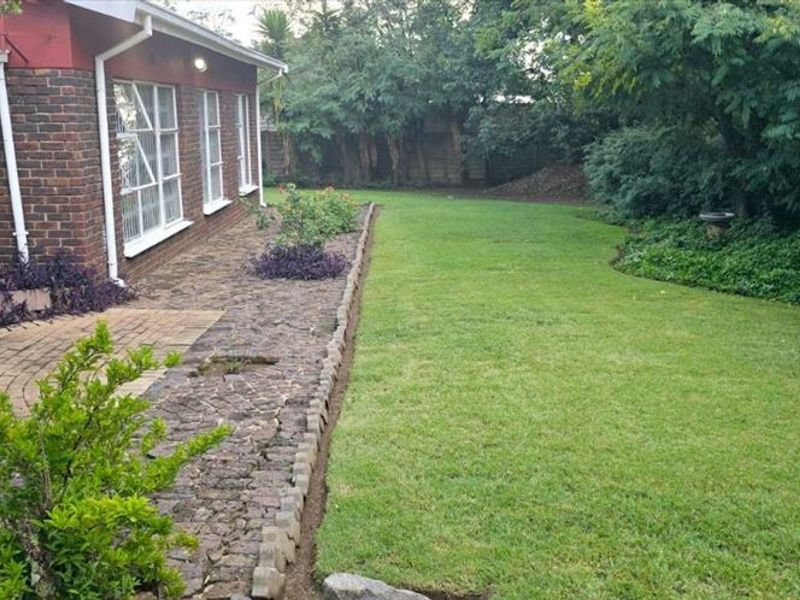 Spacious 3-Bedroom Home with Staff Quarters and Carports for Sale - Photo 3