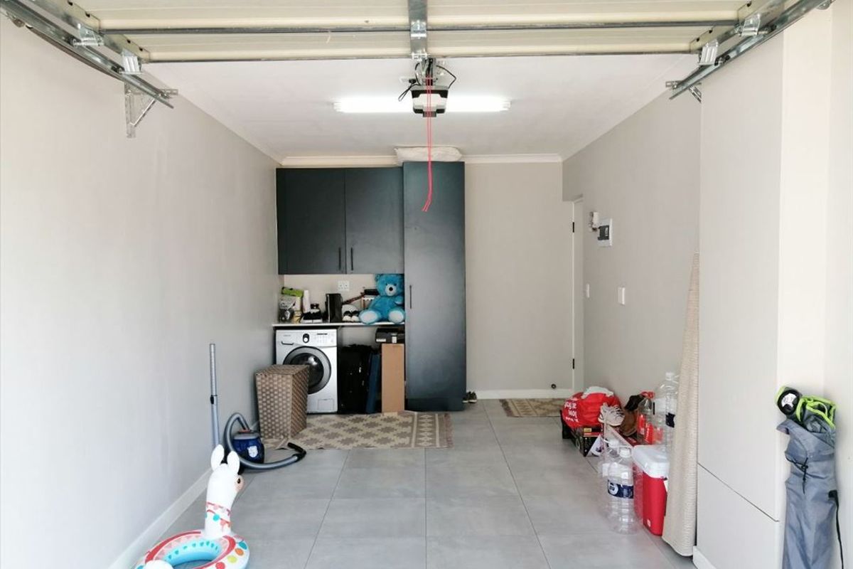 Charming 3-Bedroom Home with Pool and Garage for Sale - Photo 3