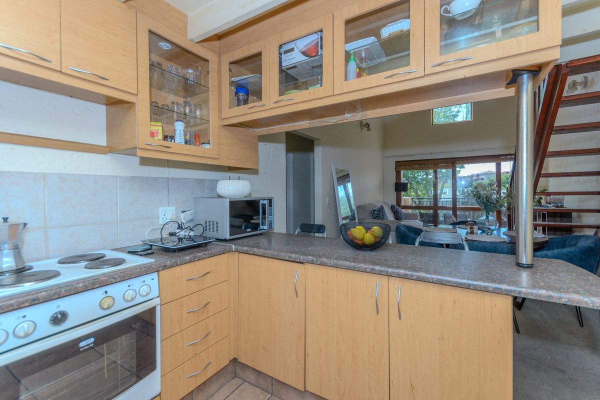 Stunning 2-Bedroom, Loft Apartment in Secure 24-Hour Guarded Estate!  - Photo 4