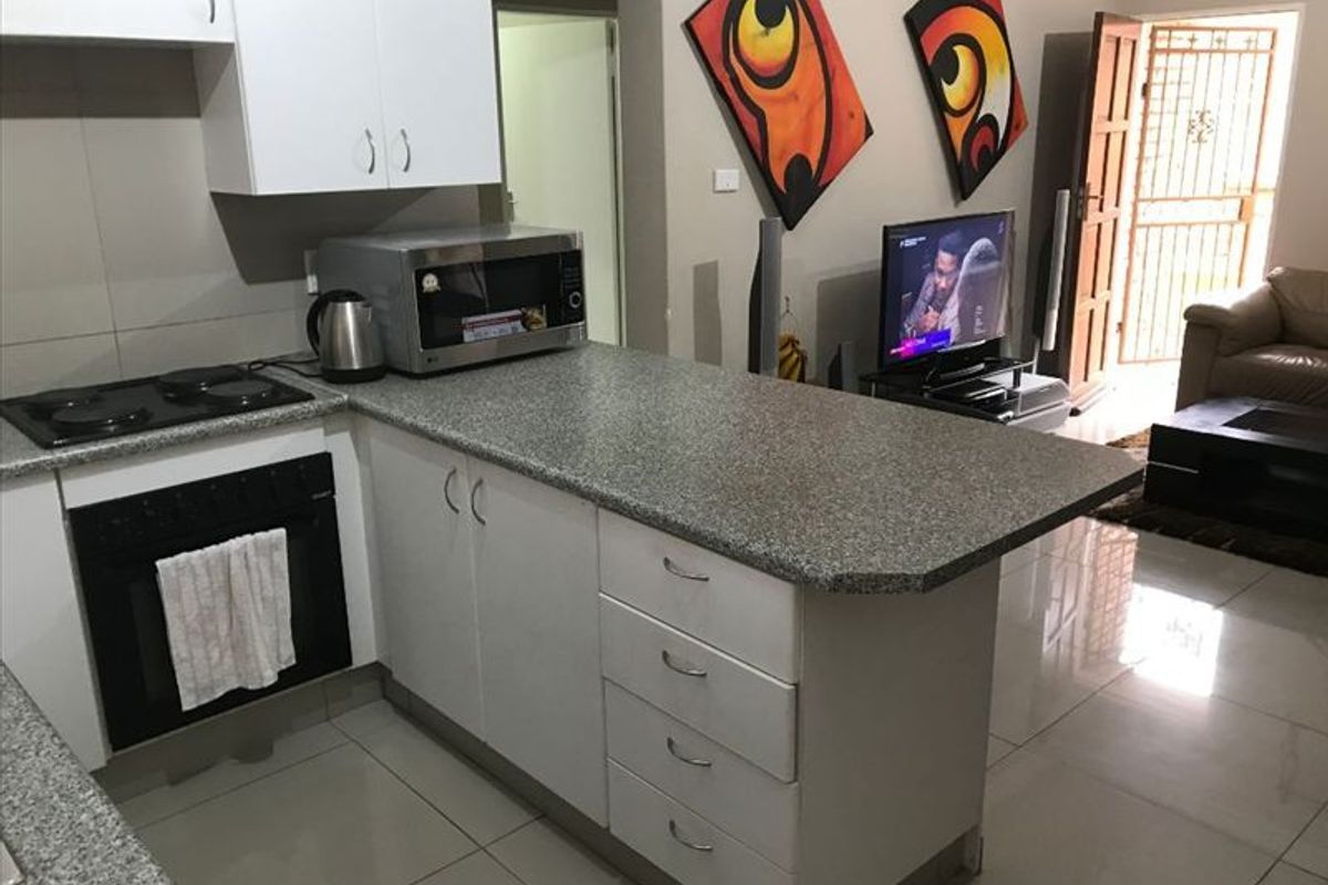 Cozy Home with Essential Amenities - Photo 2