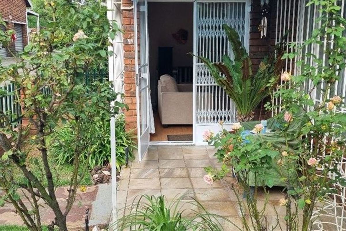 Charming Three-Bedroom Home with Practical Features - Photo 2