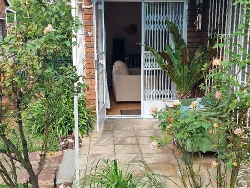 Charming Three-Bedroom Home with Practical Features - Photo 2