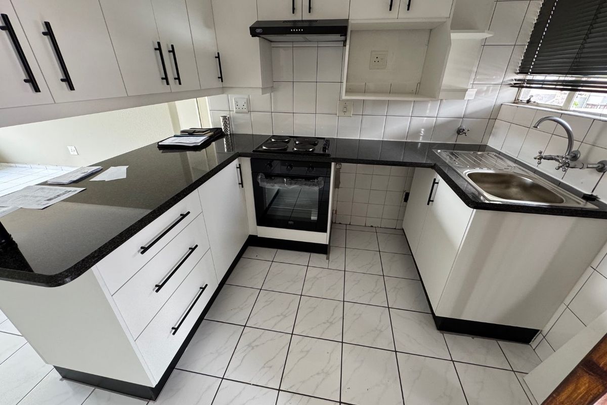 Charming Two-Bedroom Home with Pool - Photo 2