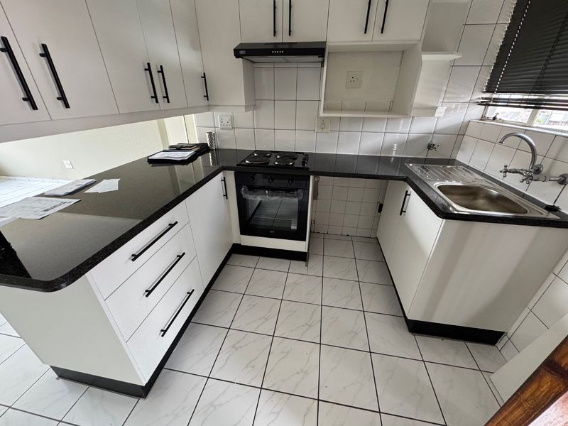 Charming Two-Bedroom Home with Pool - Photo 2