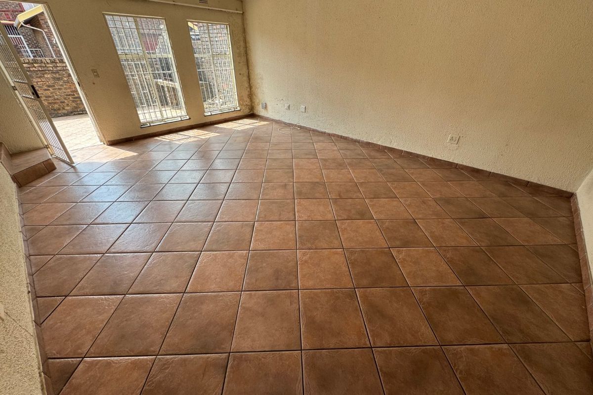 Cozy Two-Bedroom Home with Secure Parking - Photo 5