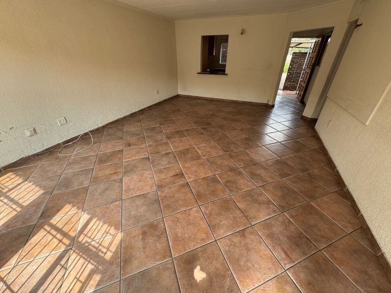 Cozy Two-Bedroom Home with Secure Parking - Photo 6