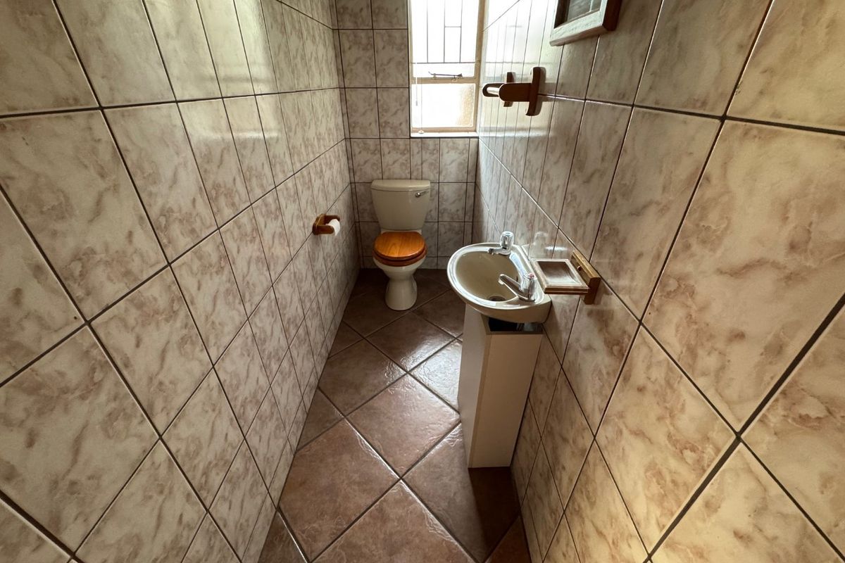 Cozy Two-Bedroom Home with Secure Parking - Photo 4