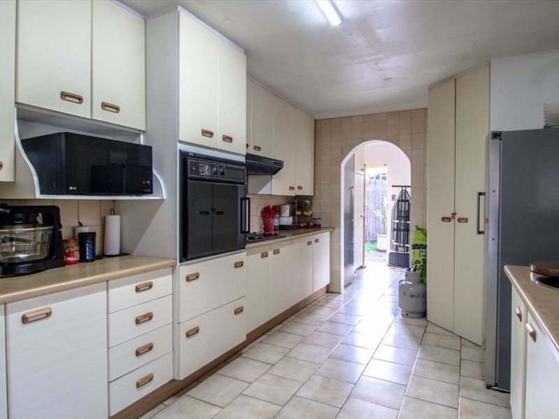 Spacious Four-Bedroom Home with Pool and Ample Parking - Photo 2