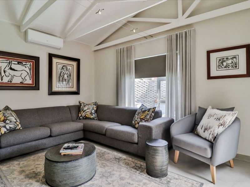 Elegant Four-Bedroom Home with Pool and Study - Photo 2