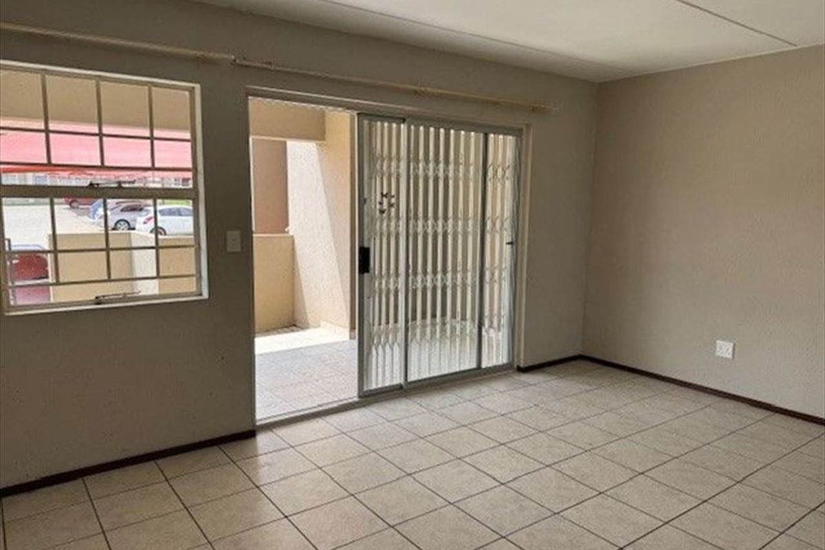 Cozy Two-Bedroom Home with Secure Parking - Photo 3