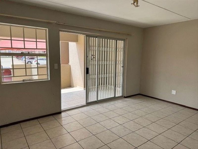 Cozy Two-Bedroom Home with Secure Parking - Photo 3