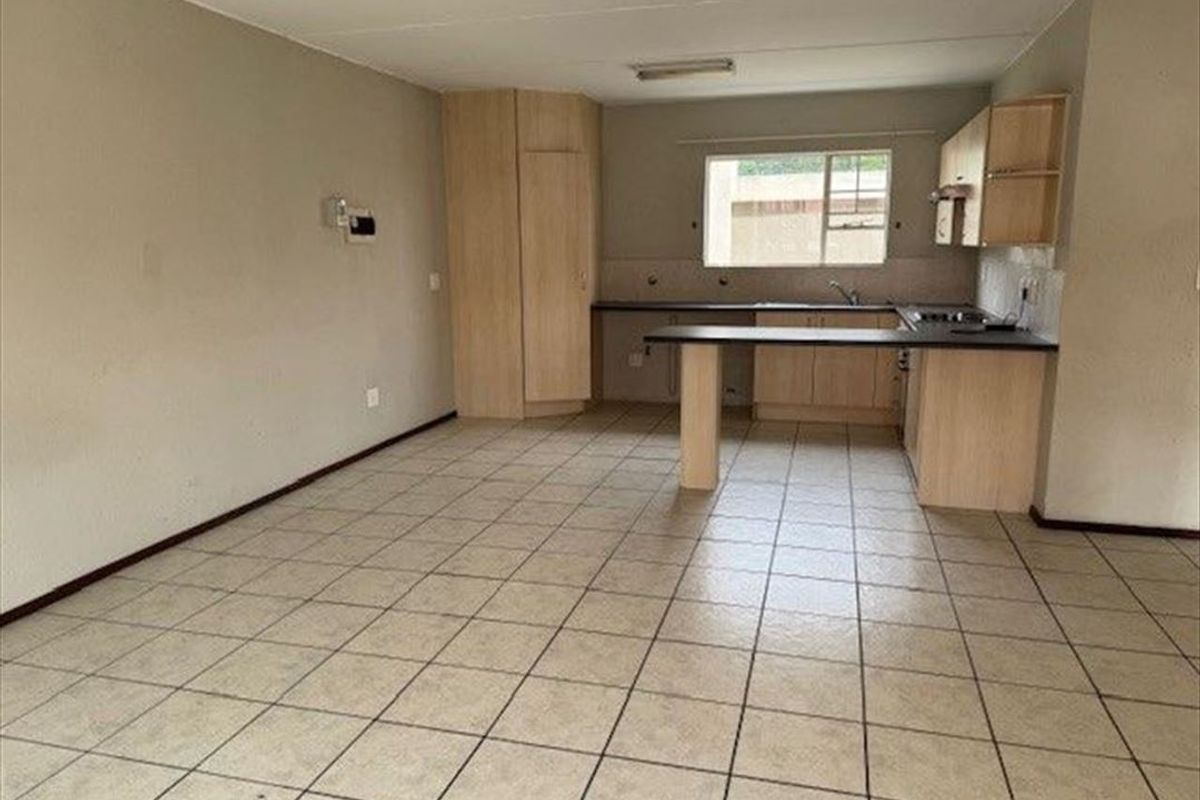 Cozy Two-Bedroom Home with Secure Parking - Photo 2