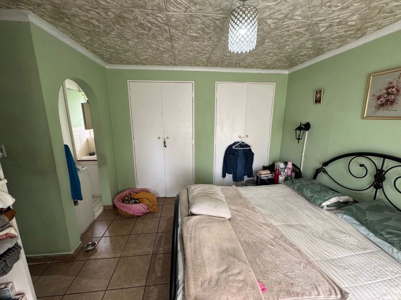 Cozy Family Home with Ample Space and Practical Features - Photo 9