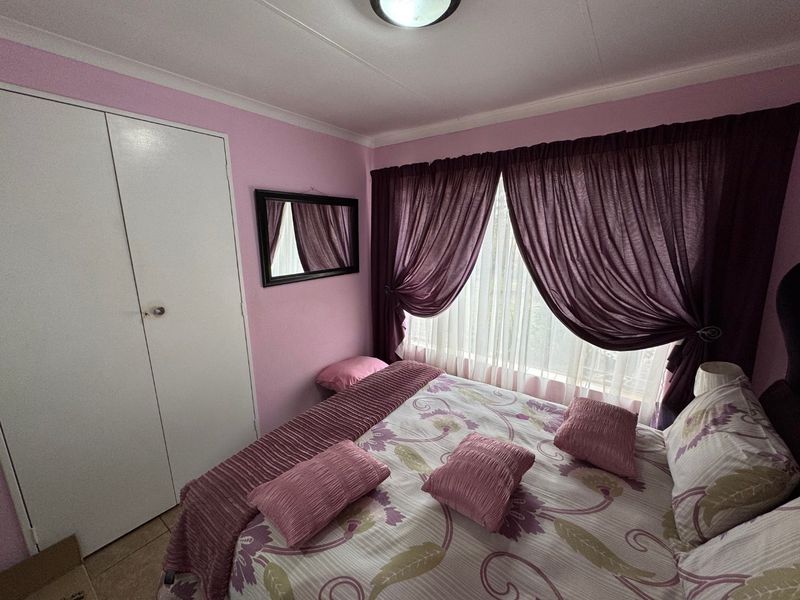 Cozy Family Home with Ample Space and Practical Features - Photo 7