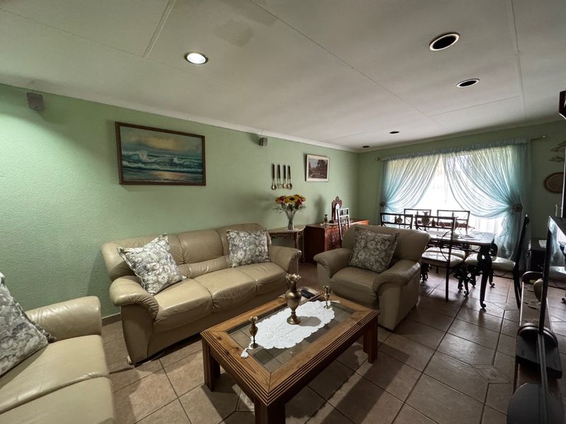 Cozy Family Home with Ample Space and Practical Features - Photo 5