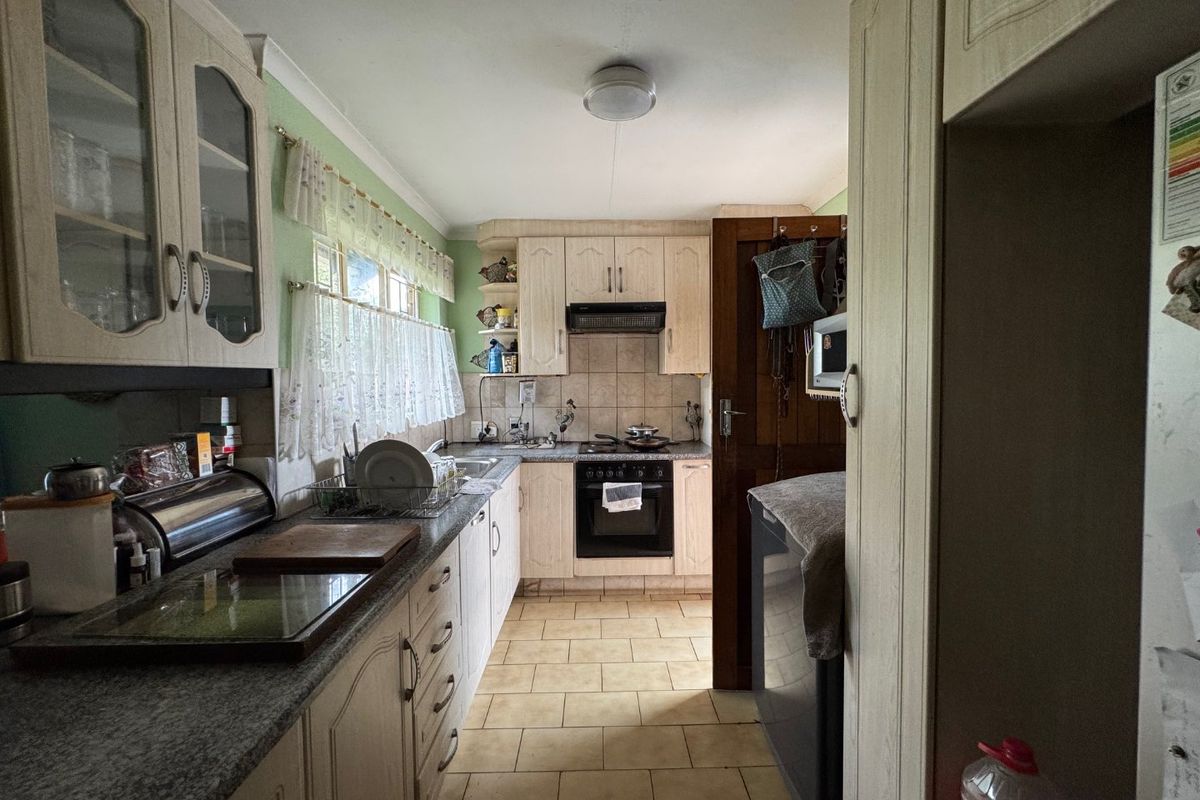 Cozy Family Home with Ample Space and Practical Features - Photo 3