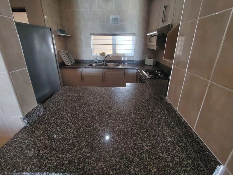 Unit level with parking area but ground floor - Photo 10