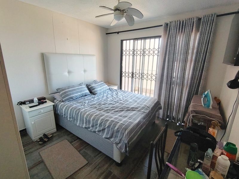 Unit level with parking area but located on first floor - Photo 8