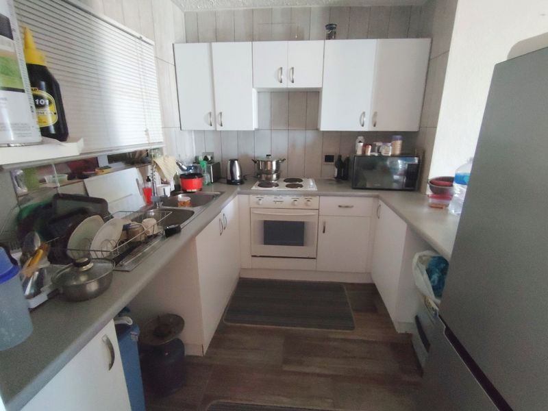 Unit level with parking area but located on first floor - Photo 7