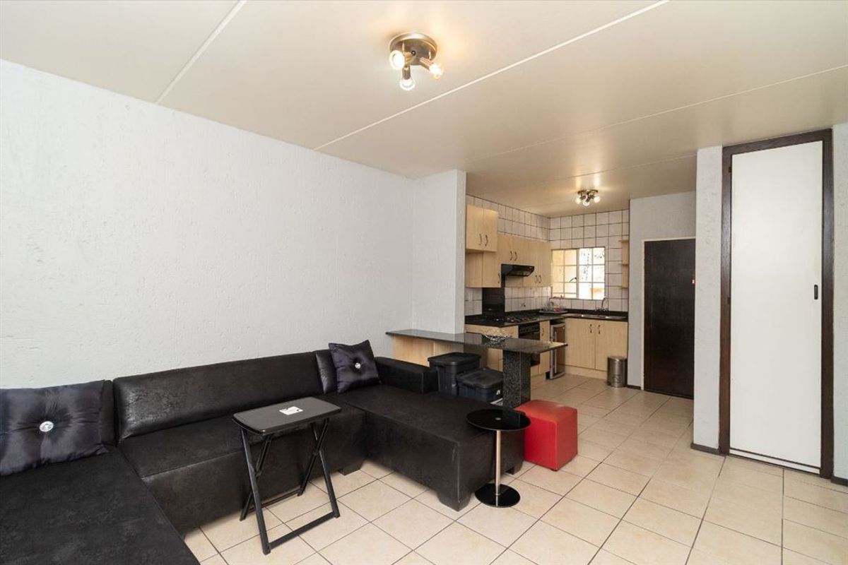 Charming 2-Bedroom Home with Pool for Sale - Photo 2