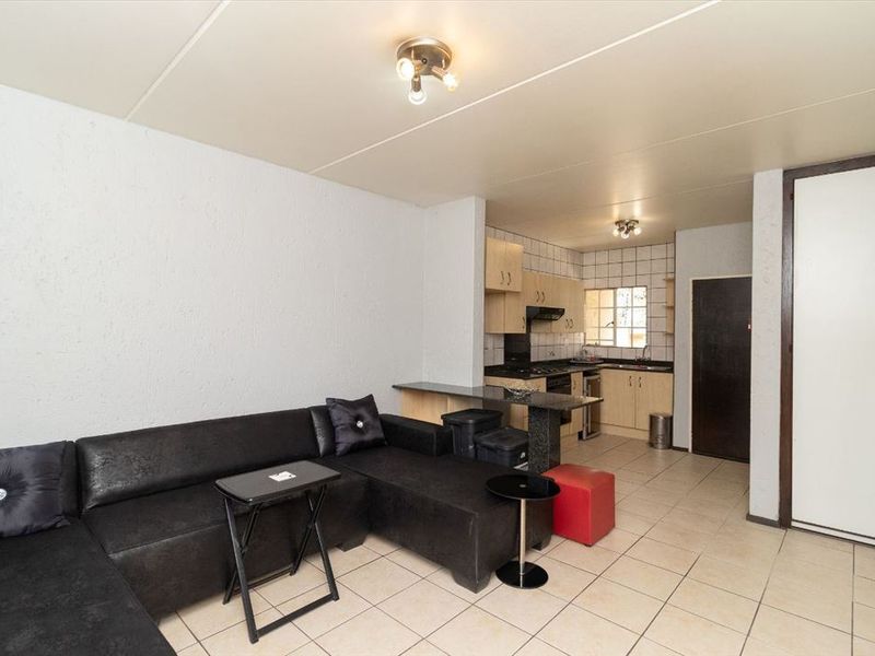 Charming 2-Bedroom Home with Pool for Sale - Photo 2