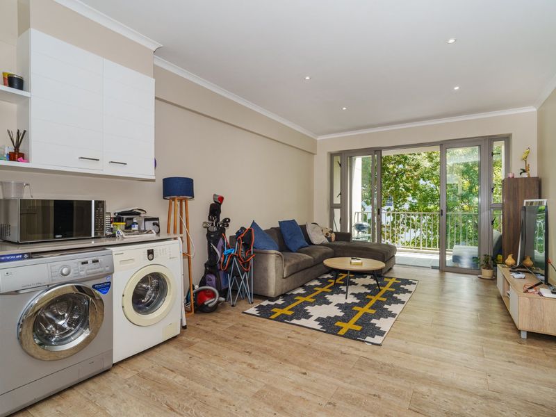 Welcome to 21 on Wellington – a modern sanctuary where style and comfort blend seamlessly in the vibrant heart of Upper Wynberg. - Photo 5