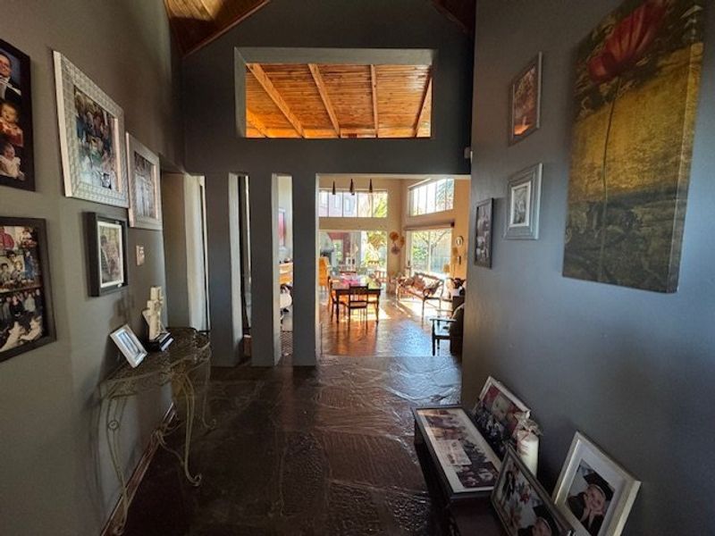 Expansive Seven-Bedroom Home with Pool and Triple Garage - Photo 3