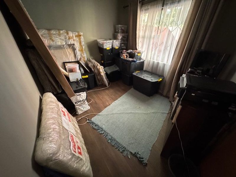 Expansive Seven-Bedroom Home with Pool and Triple Garage - Photo 9