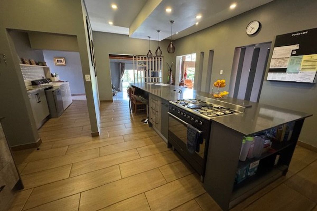 Expansive Seven-Bedroom Home with Pool and Triple Garage - Photo 4