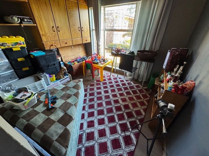 Expansive Seven-Bedroom Home with Pool and Triple Garage - Photo 6