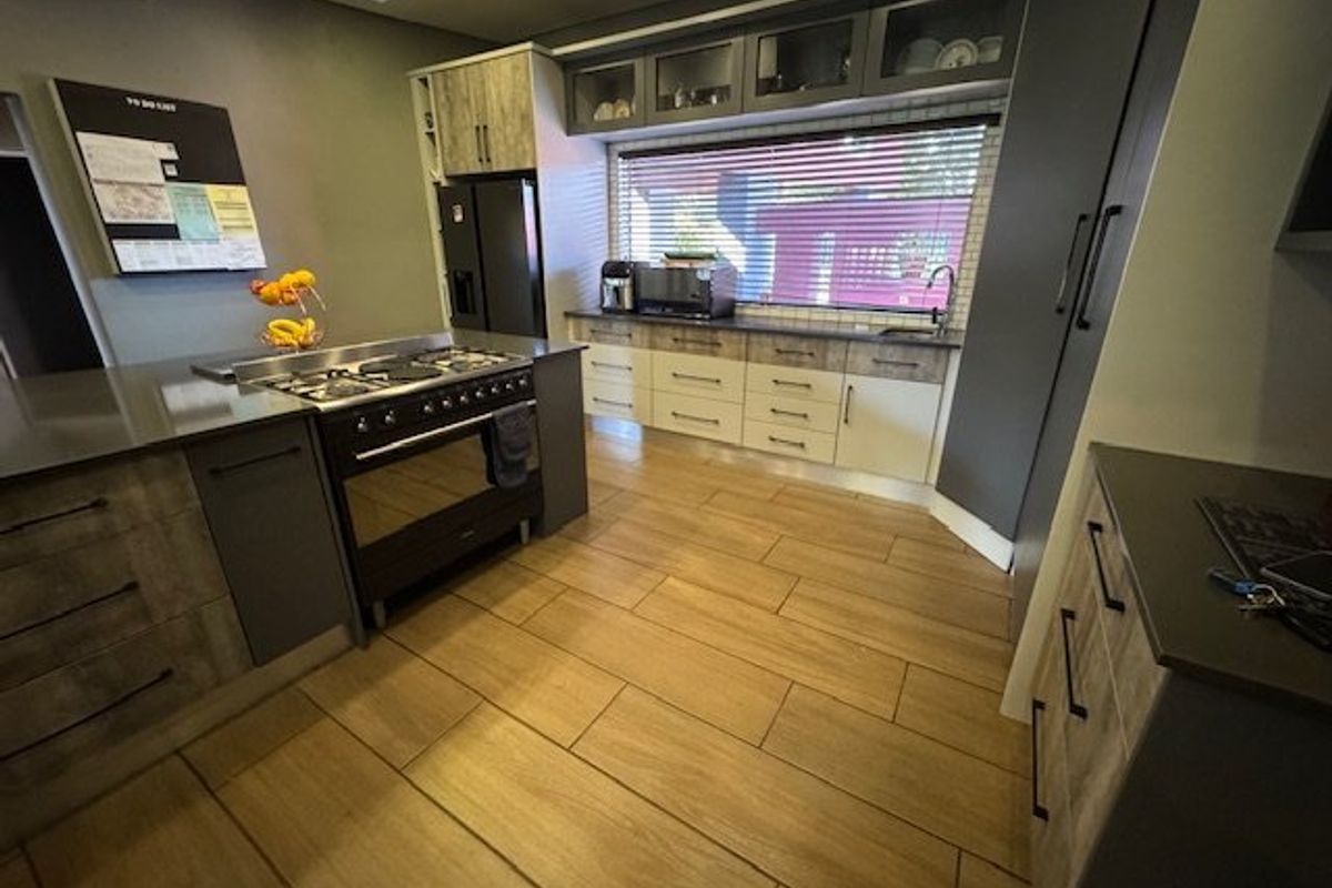 Expansive Seven-Bedroom Home with Pool and Triple Garage - Photo 5