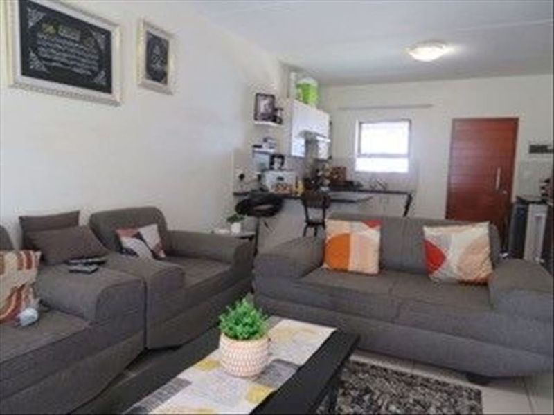 Cozy Two-Bedroom Home with Modern Comforts - Photo 2