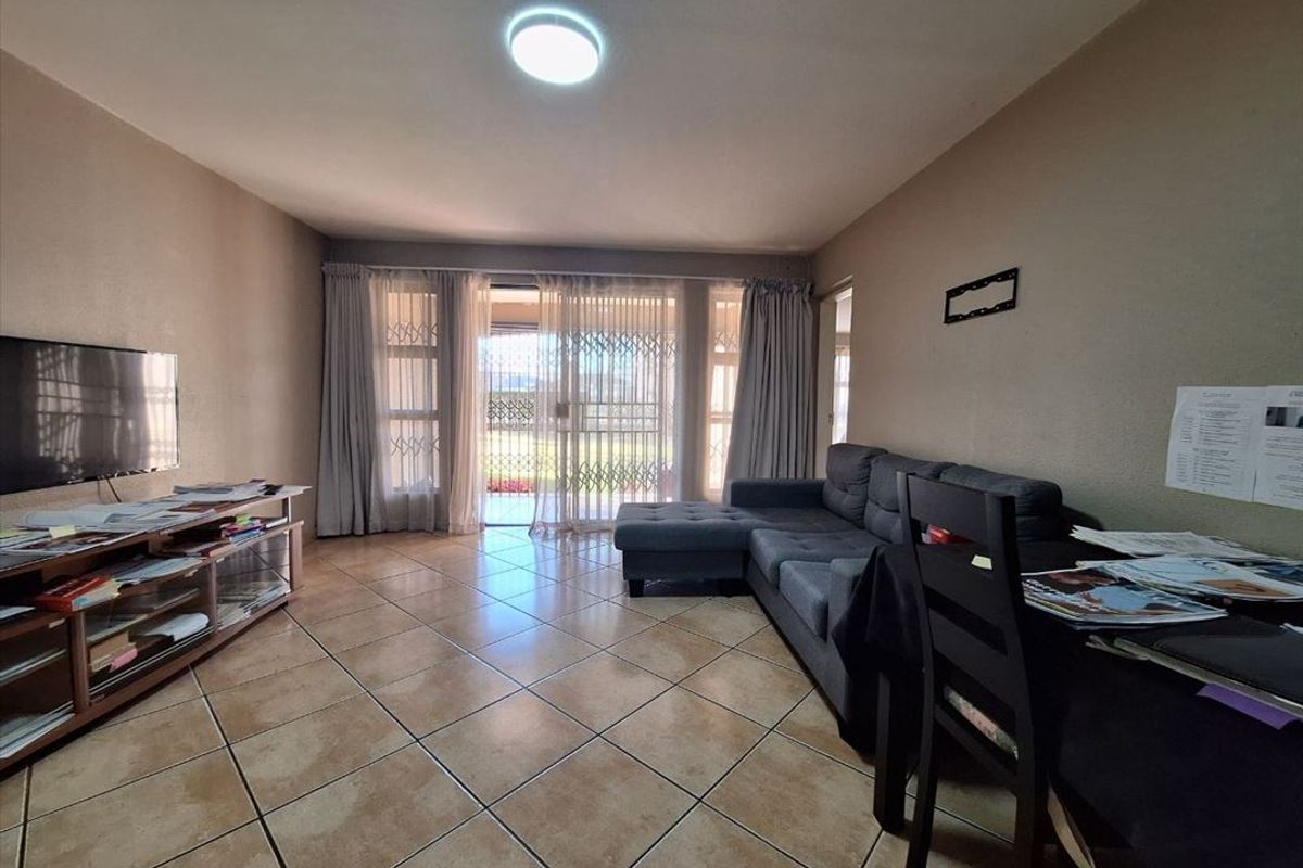 Charming 3-Bedroom Home with Pool & Spacious Living Areas - Photo 2