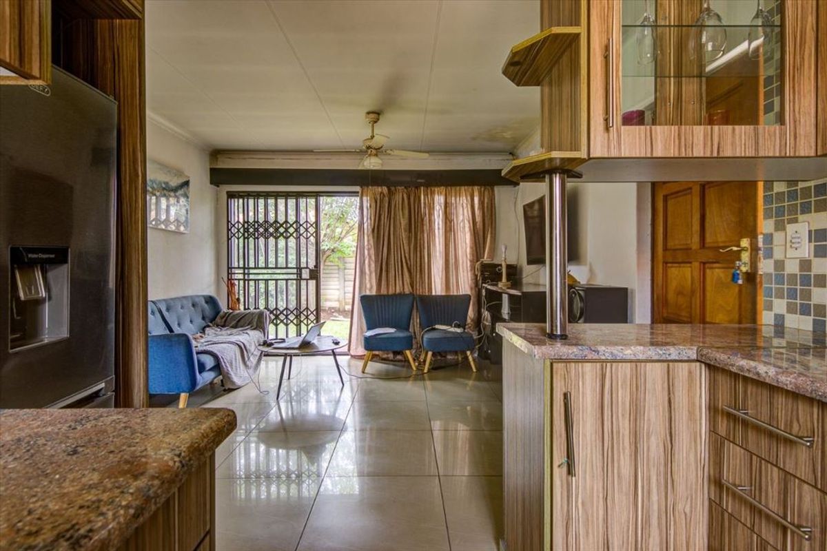 Cozy Two-Bedroom Home with Pool - Photo 2