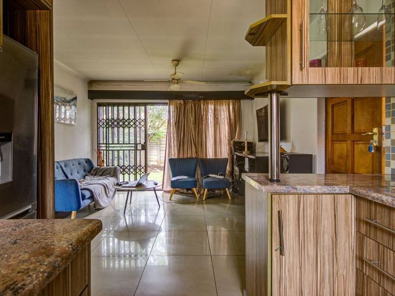 Cozy Two-Bedroom Home with Pool - Photo 2