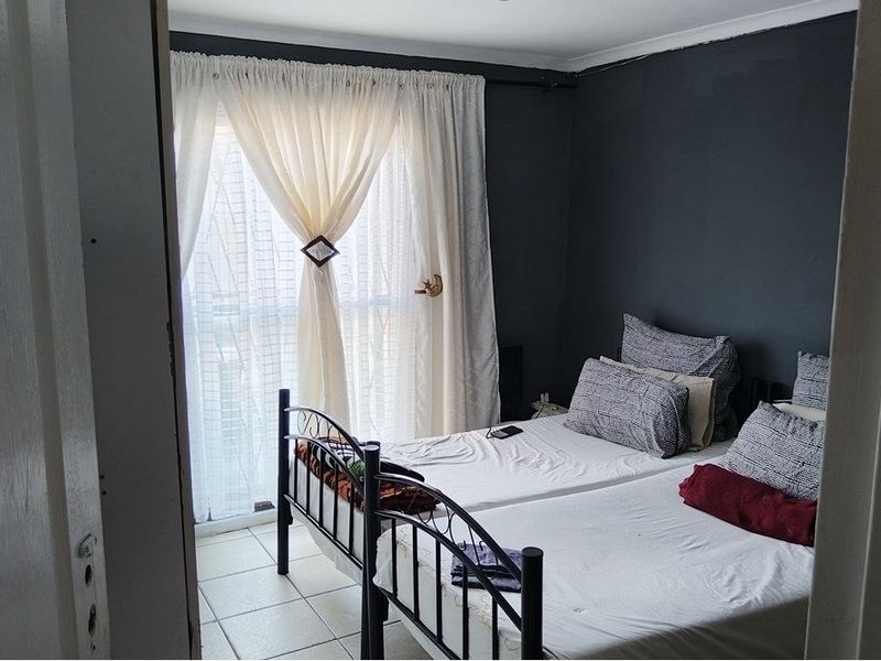 Cozy 2-Bedroom Family Home in Good Condition - Photo 10