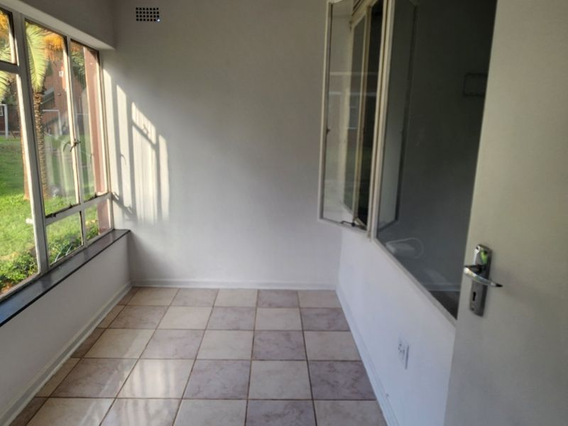 NEAT AND SPACIOUS APARTMENT IN A SECURE COMPLEX - Photo 10