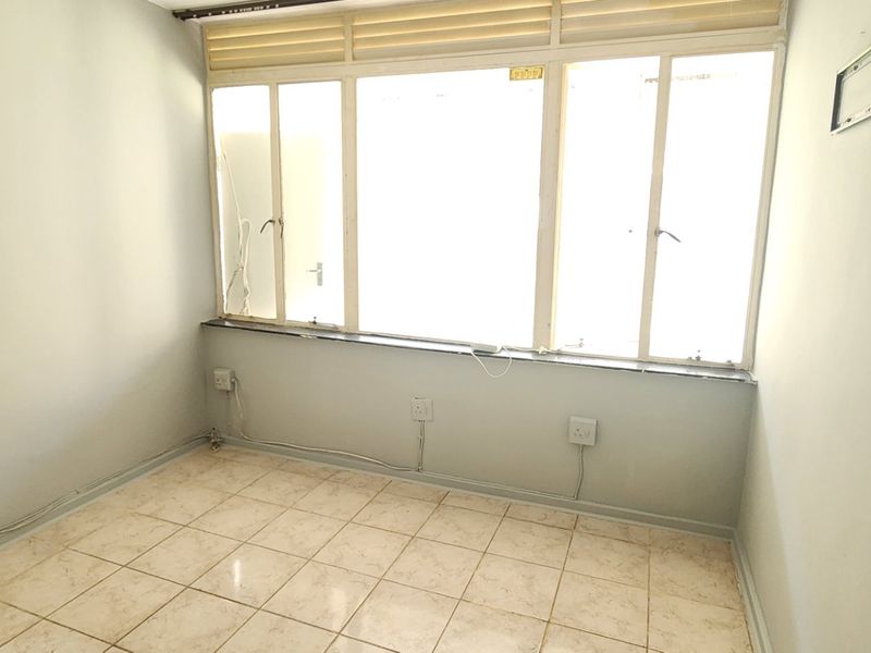 NEAT AND SPACIOUS APARTMENT IN A SECURE COMPLEX - Photo 8