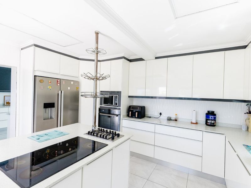 Elevate Your Lifestyle In This Stunning 5-Bedroom Architect-Designed Home! - Photo 6