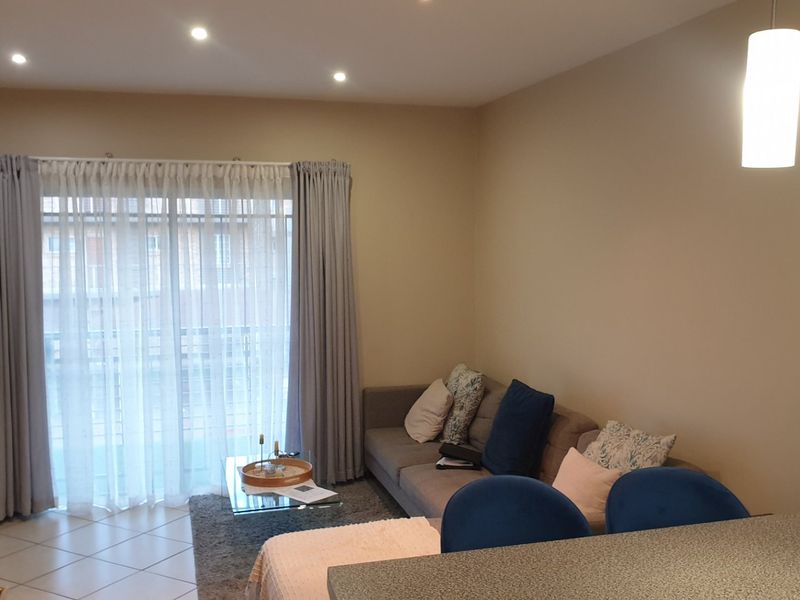 Modern 2-Bedroom Lock-Up-and-Go Apartment in Stone Gate Estate - Photo 8