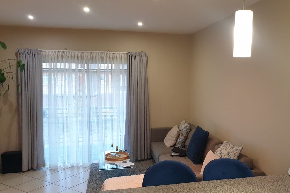 Modern 2-Bedroom Lock-Up-and-Go Apartment in Stone Gate Estate - Photo 5