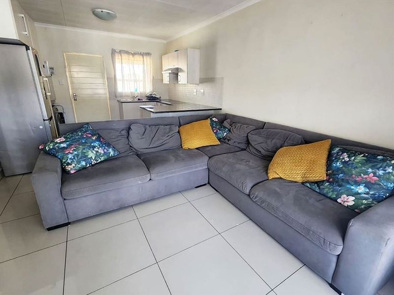 Cozy 2-Bedroom Starter Home with Essential Comforts - Photo 2