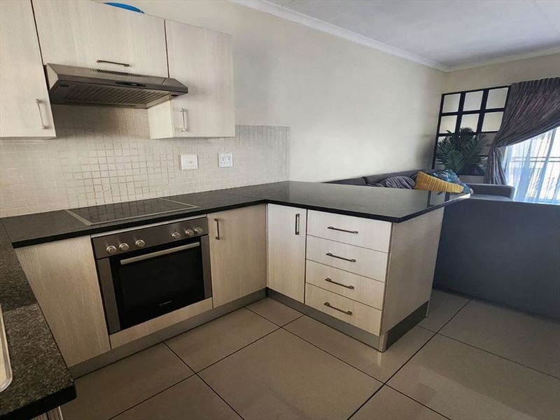 Cozy 2-Bedroom Starter Home with Essential Comforts - Photo 1