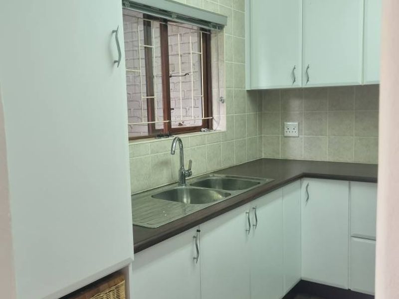 Spacious 3-Bedroom Simplex for Sale in Prestbury — Secure, Pet-Friendly & Packed with Potential - Photo 7