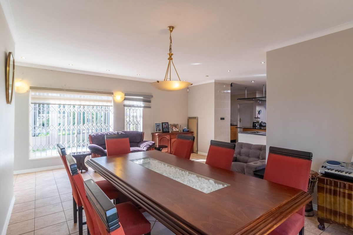 Expansive 7 Bedroom Home Offering Comfortable and Versatile Living in a Peaceful Neighborhood. - Photo 5