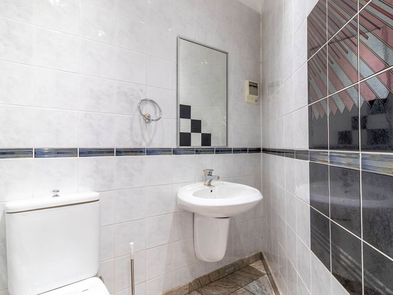 Expansive 7 Bedroom Home Offering Comfortable and Versatile Living in a Peaceful Neighborhood. - Photo 10