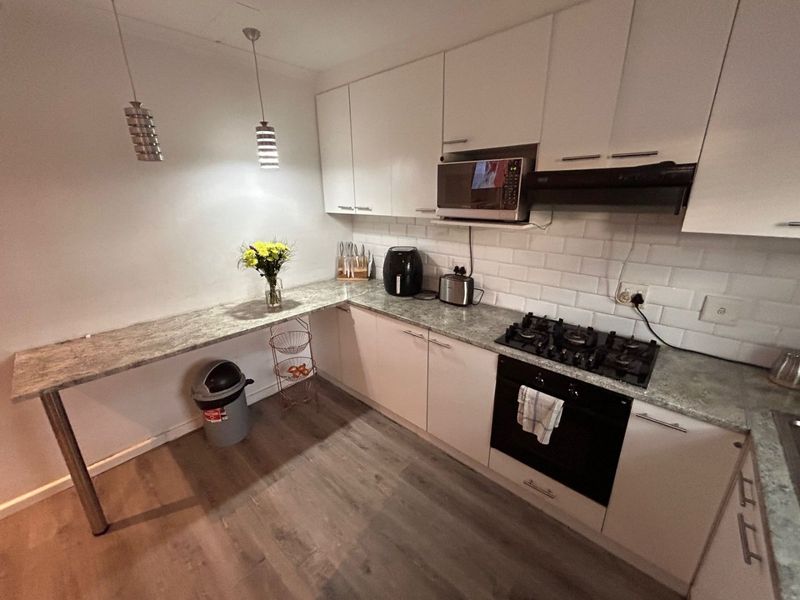 Originally a two bedroom house converted into a spacious one bedroom enclose property - Photo 10