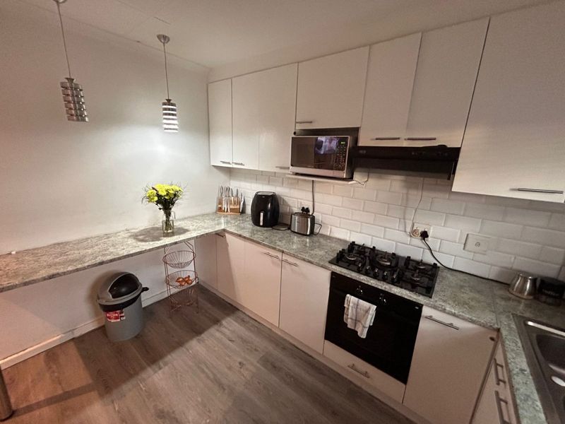 Originally a two bedroom house converted into a spacious one bedroom enclose property - Photo 7