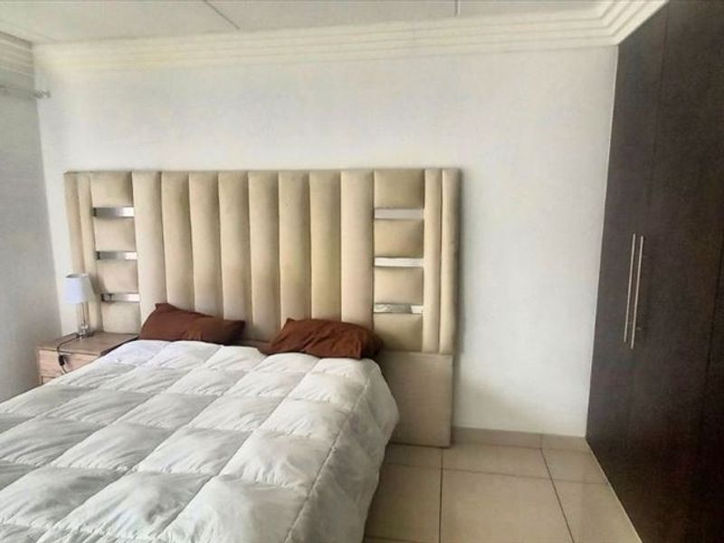 Cozy Two-Bedroom Home with En-Suite and Pool - Photo 3