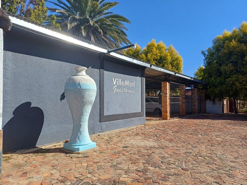 Prime Investment Opportunity: Thriving Guesthouse for Sale in Wilkoppies, Klerksdorp - Photo 2